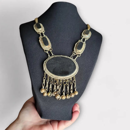 Conjunto de collar y pulsera metal étnico bohemio con detalles en negro