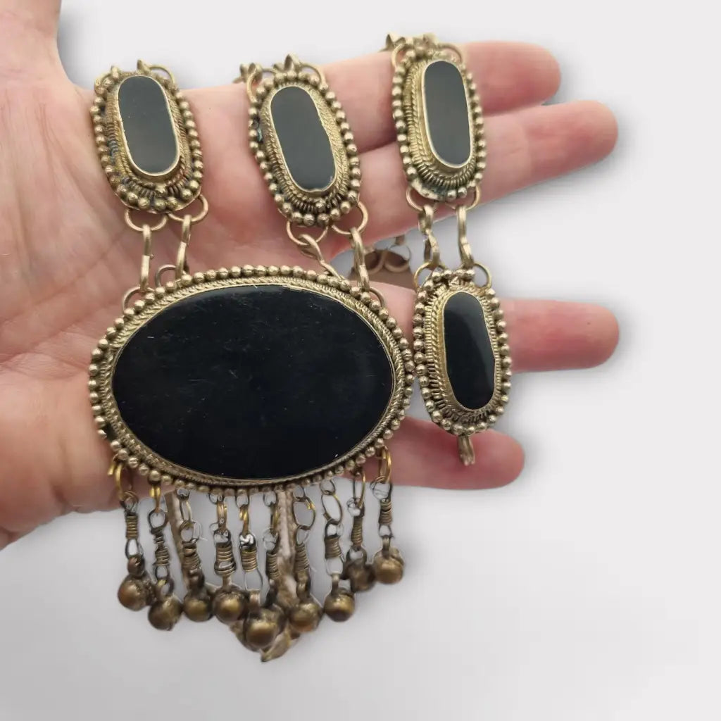 Conjunto de collar y pulsera metal étnico bohemio con detalles en negro