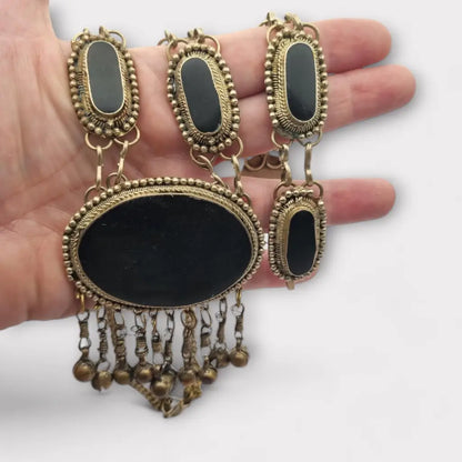 Conjunto de collar y pulsera metal étnico bohemio con detalles en negro