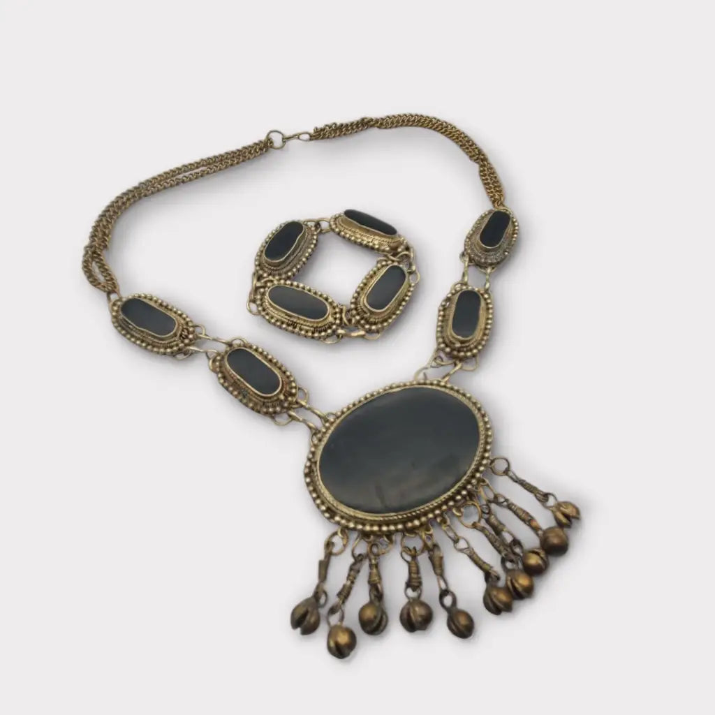 Conjunto de collar y pulsera metal étnico bohemio con detalles en negro