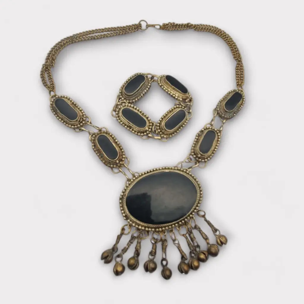 Conjunto de collar y pulsera metal étnico bohemio con detalles en negro