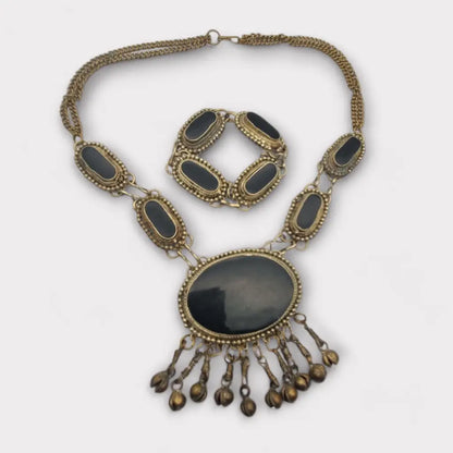 Conjunto de collar y pulsera metal étnico bohemio con detalles en negro