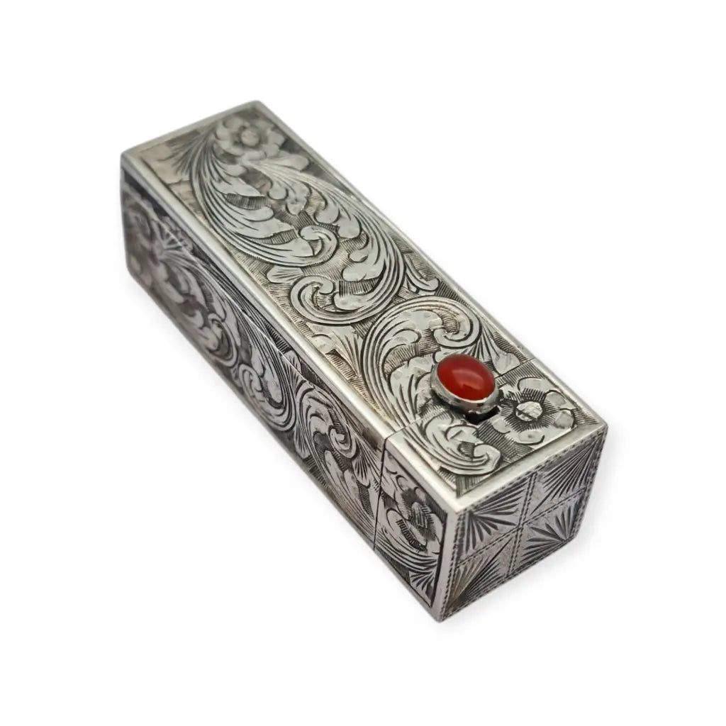 Estuche pintalabios antiguo de plata grabada con espejo y piedra cornalina