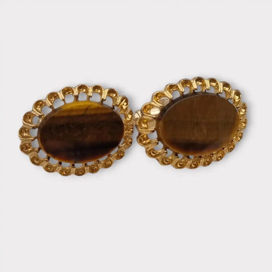 Gemelos vintage ovalados con piedra de ojo tigre y marco dorado detallado