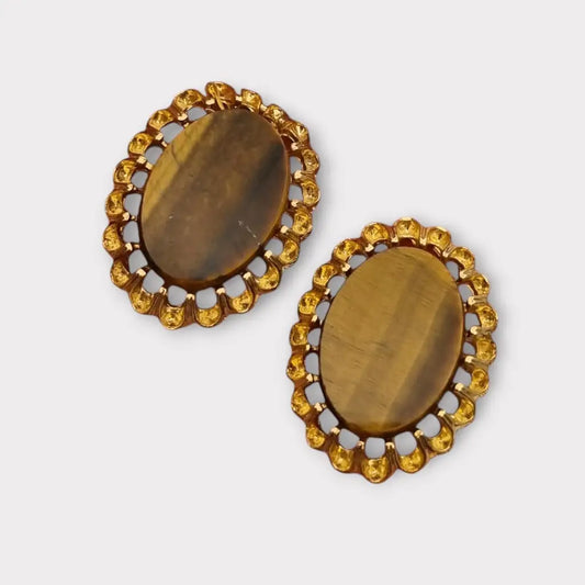 Gemelos vintage ovalados con piedra de ojo tigre y marco dorado detallado
