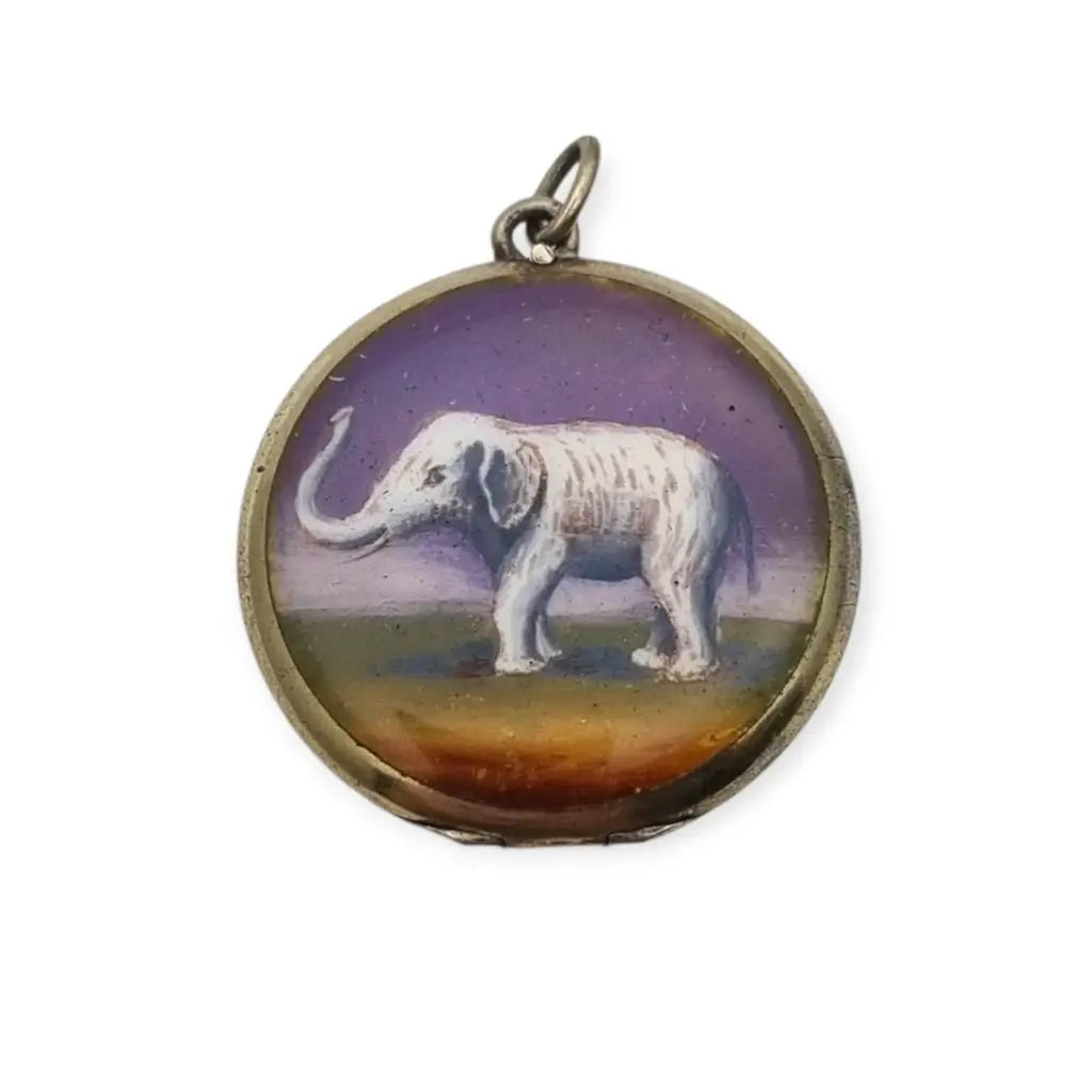 Guardapelo F.B.E Genève Art Nouveau en plata 935 esmaltada de elefante
