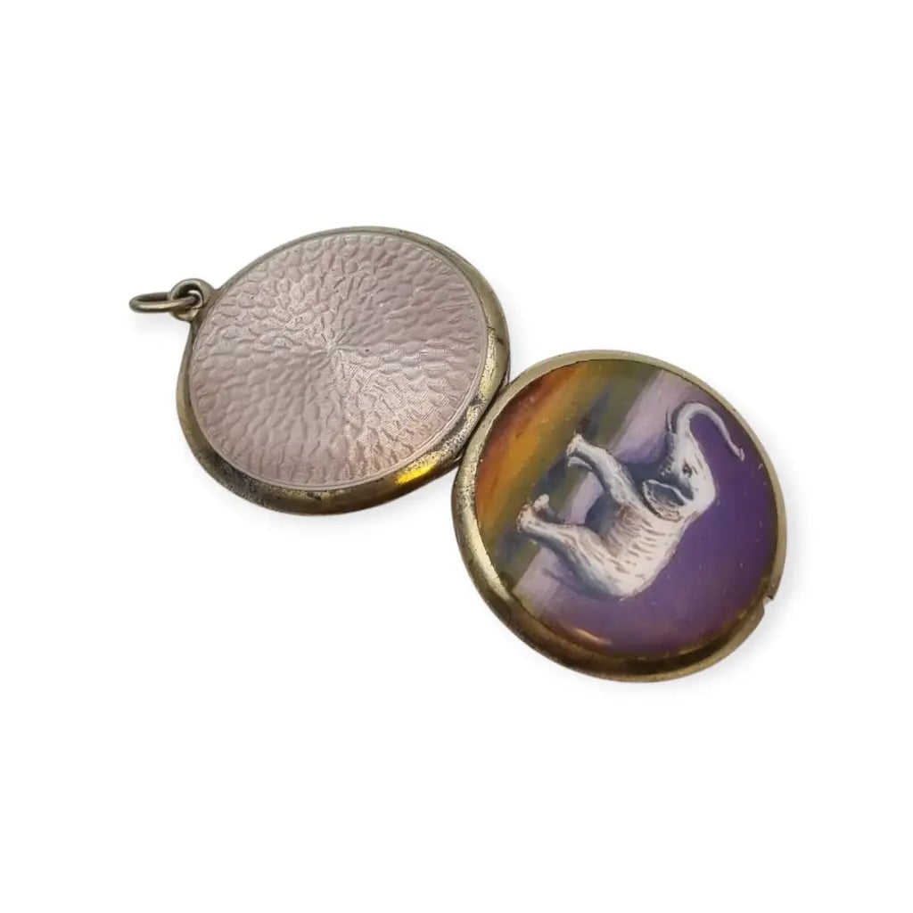 Guardapelo F.B.E Genève Art Nouveau en plata 935 esmaltada de elefante