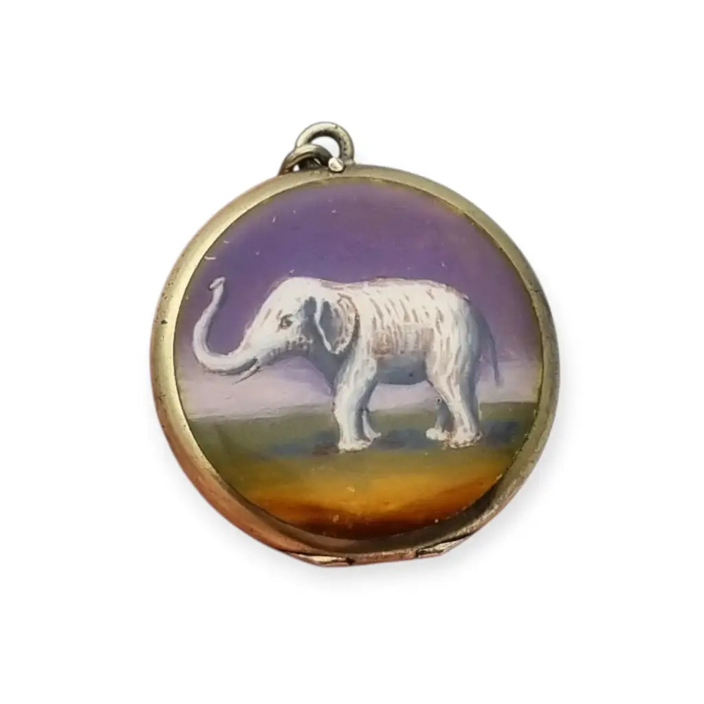 Guardapelo F.B.E Genève Art Nouveau en plata 935 esmaltada de elefante