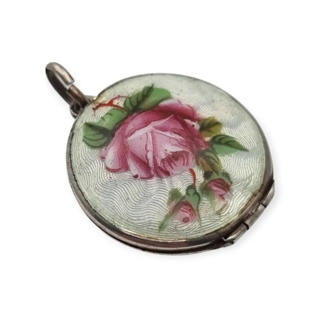 Guardapelo de plata 800 con esmalte guilloché floral rosa y azul joyería