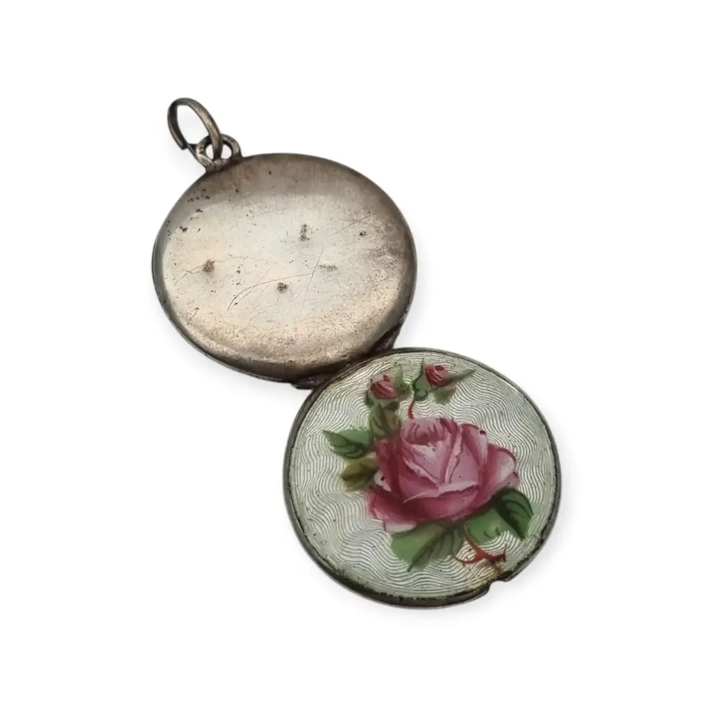 Guardapelo de plata 800 con esmalte guilloché floral rosa y azul joyería