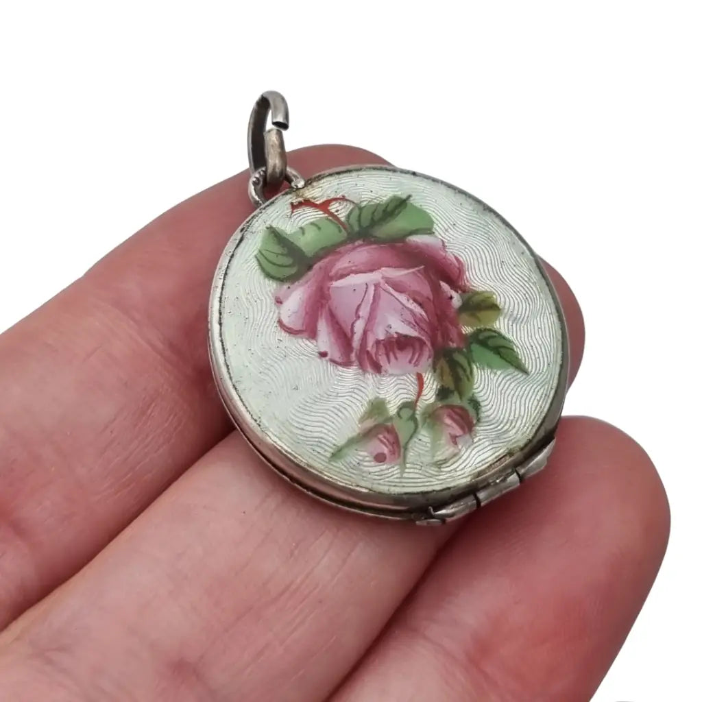 Guardapelo de plata 800 con esmalte guilloché floral rosa y azul joyería