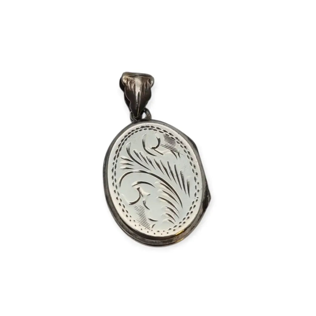 Guardapelo vintage ovalado de plata 925 con grabado vegetal y anilla