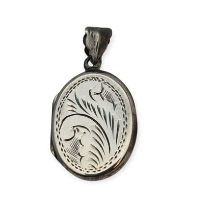 Guardapelo vintage ovalado de plata 925 con grabado vegetal y anilla