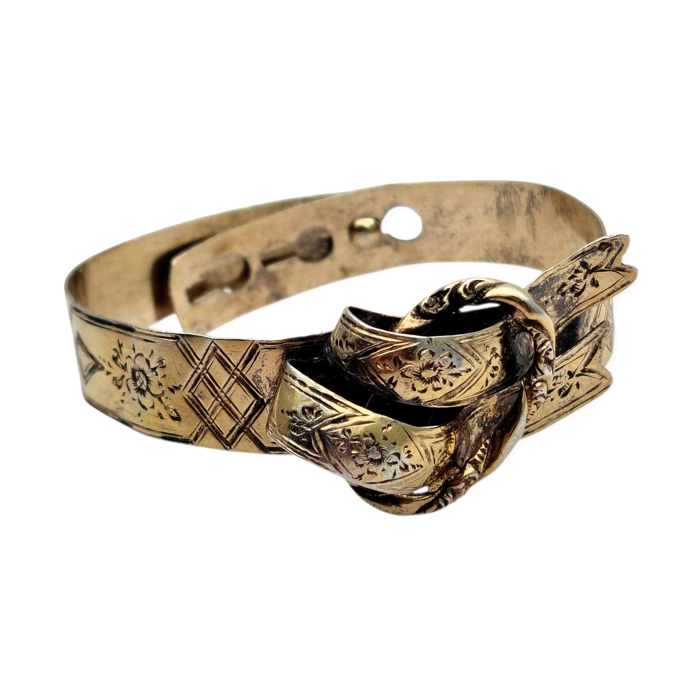 Brazalete victoriano europeo en plata dorada grabado floral con lazo central, finales siglo XIX