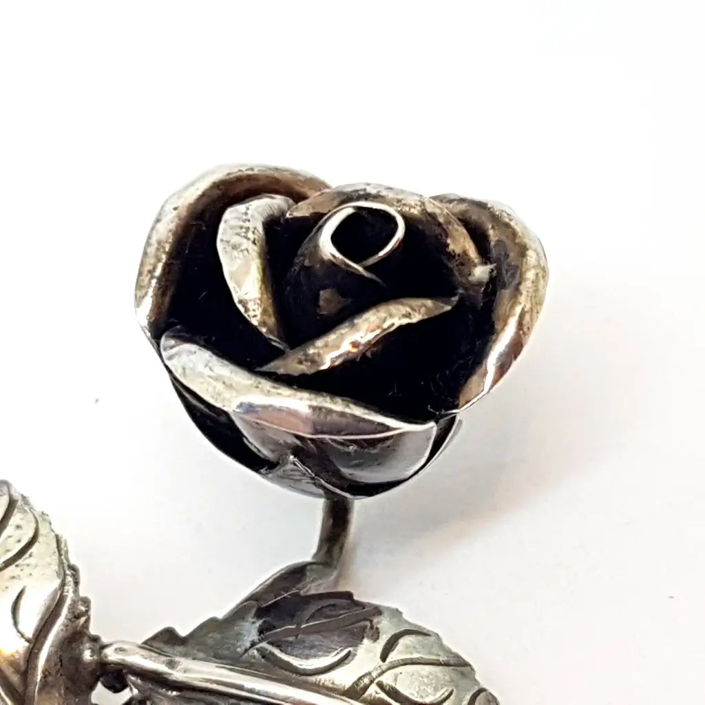 Broche rosa de plata ramo flores. Circa 1950. Joyería antigua y vintage.