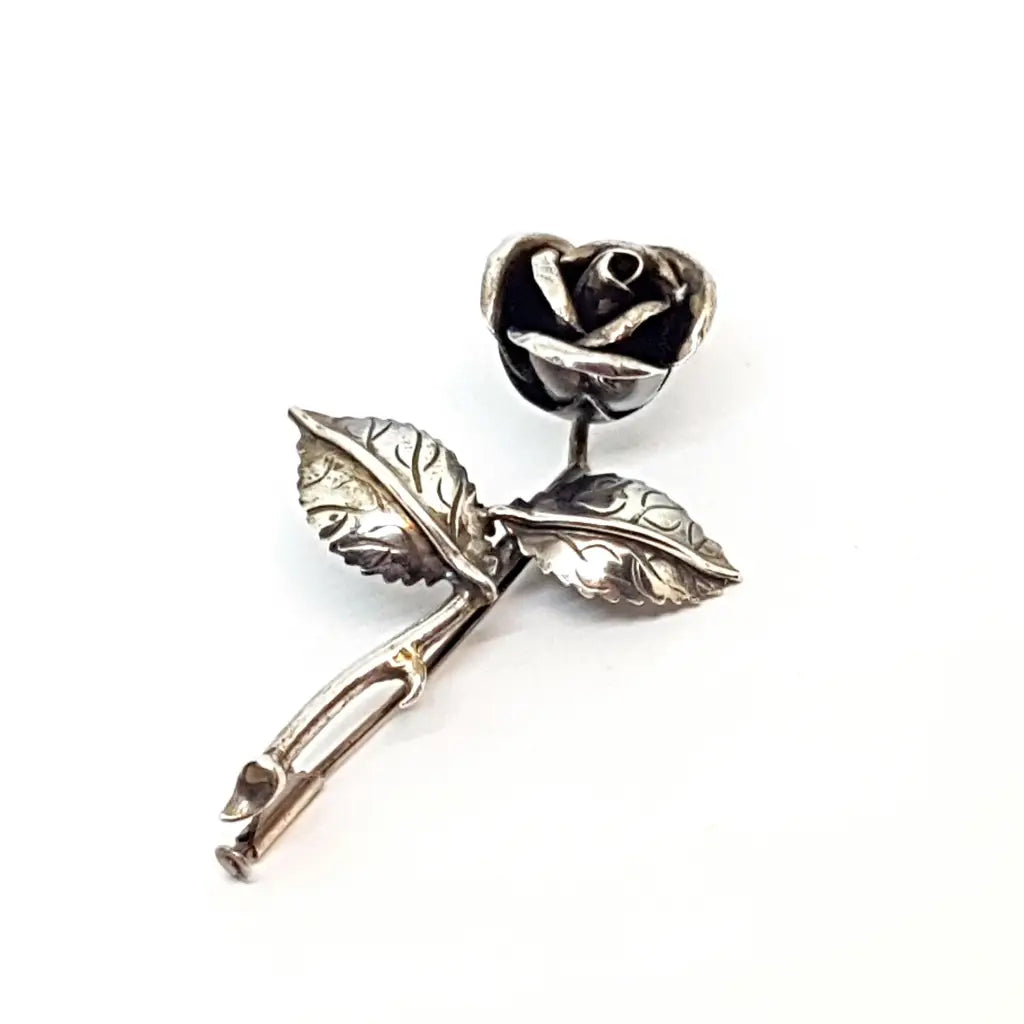 Broche rosa de plata ramo flores. Circa 1950. Joyería antigua y vintage.