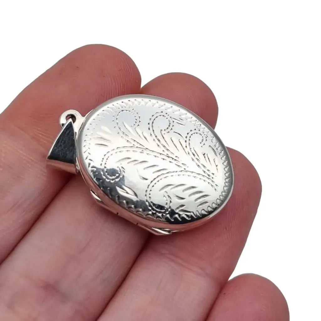 Medallón en forma de óvalo plata ley antigua vintage portafotos colgante