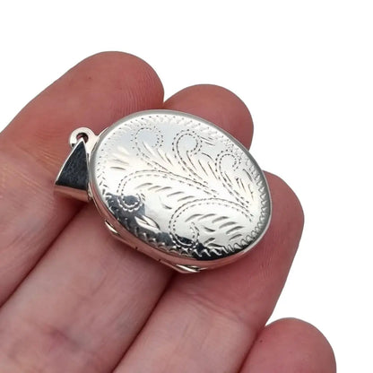 Medallón en forma de óvalo plata ley antigua vintage portafotos colgante