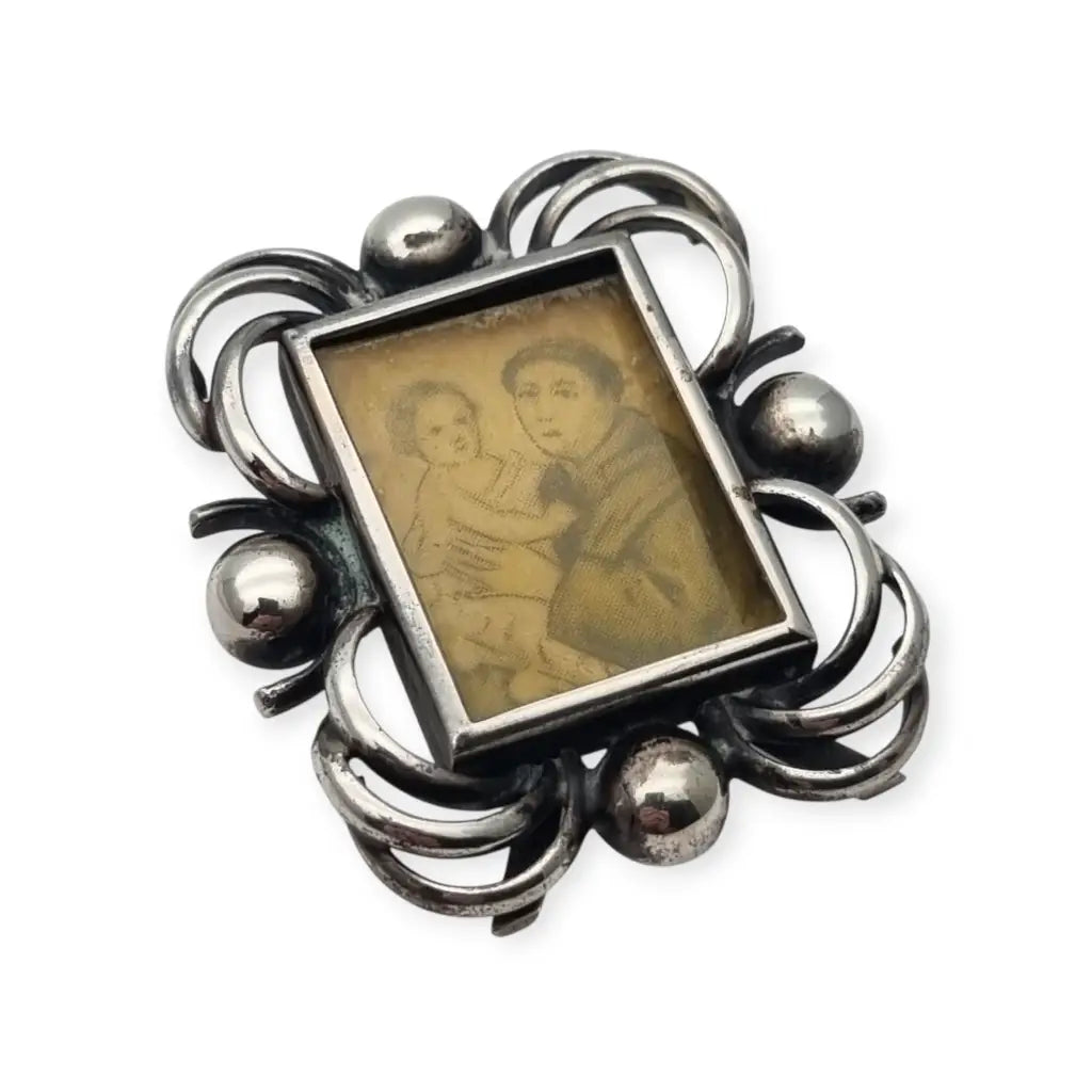 Marco de viaje en plata con imagen San Antonio Padua y Niño Jesús