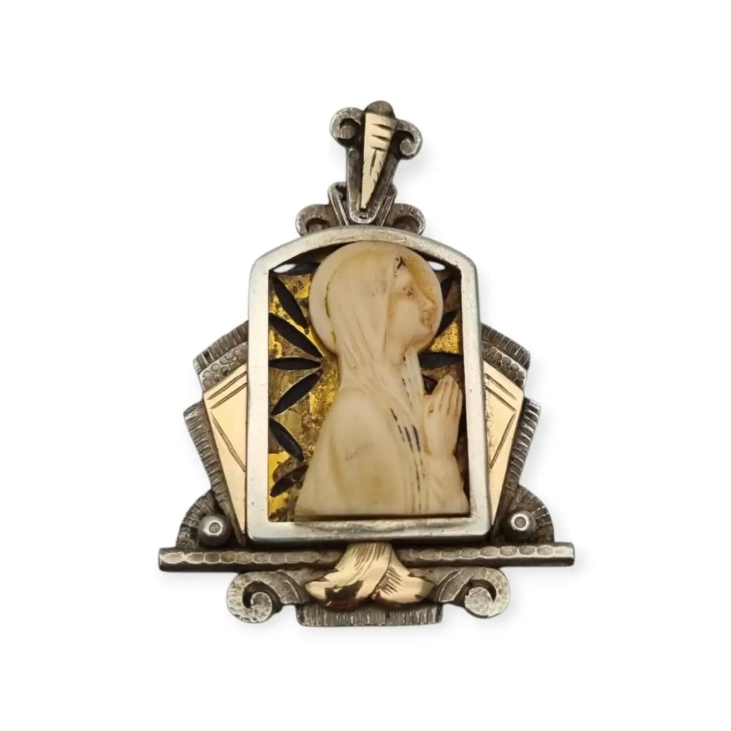 Medalla Art Decó de plata y vistas doradas con Virgen tallada circa 1930 joya