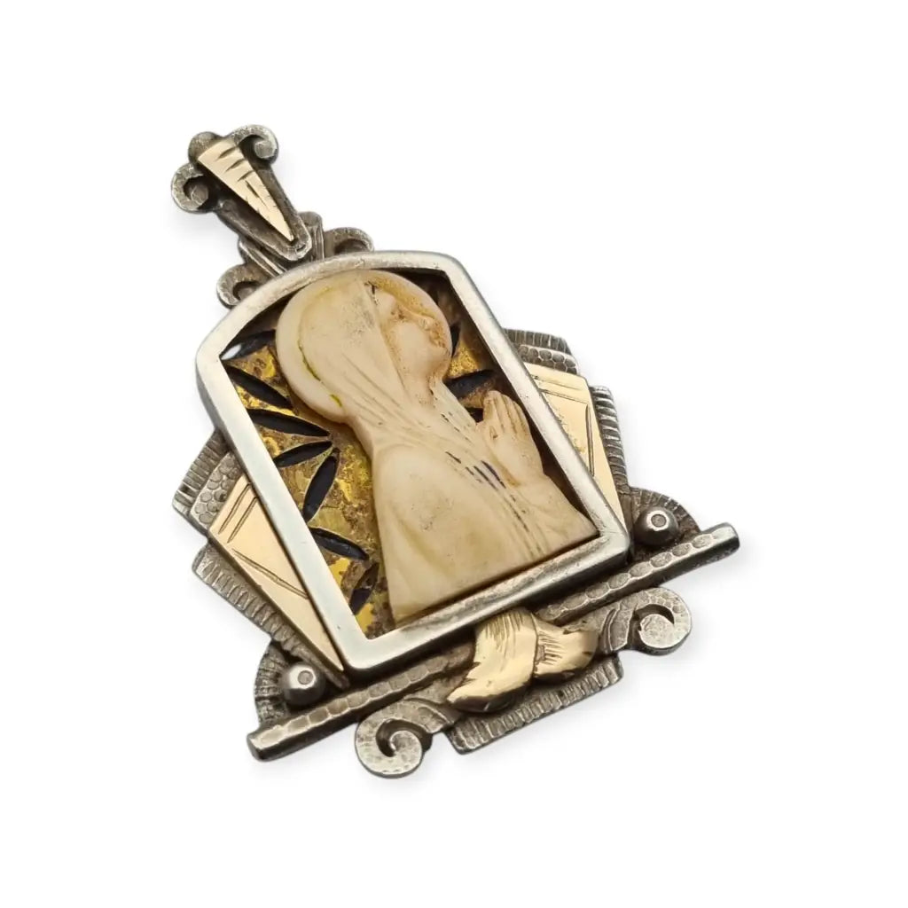Medalla Art Decó de plata y vistas doradas con Virgen tallada circa 1930 joya
