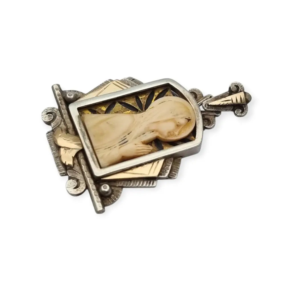 Medalla Art Decó de plata y vistas doradas con Virgen tallada circa 1930 joya