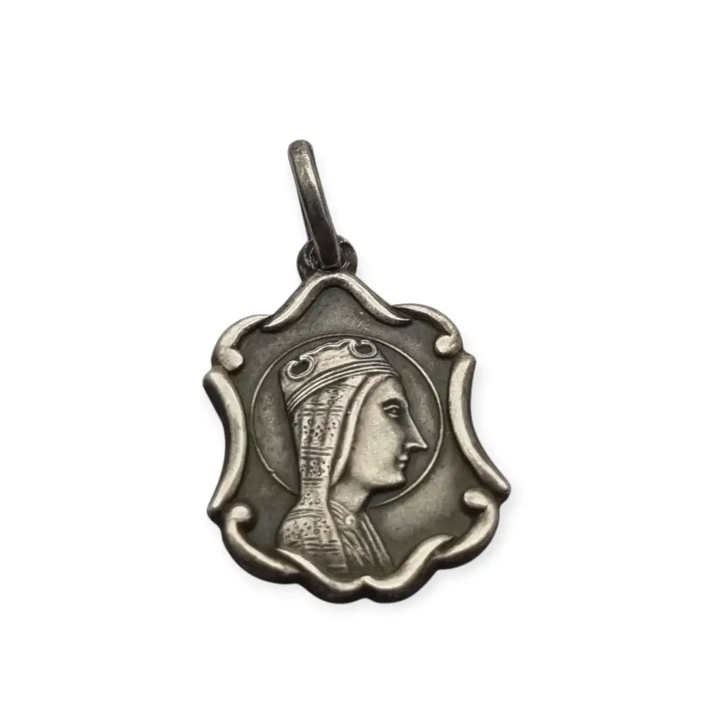 Medalla religiosa antigua en plata con la Moreneta de Montserrat estilo