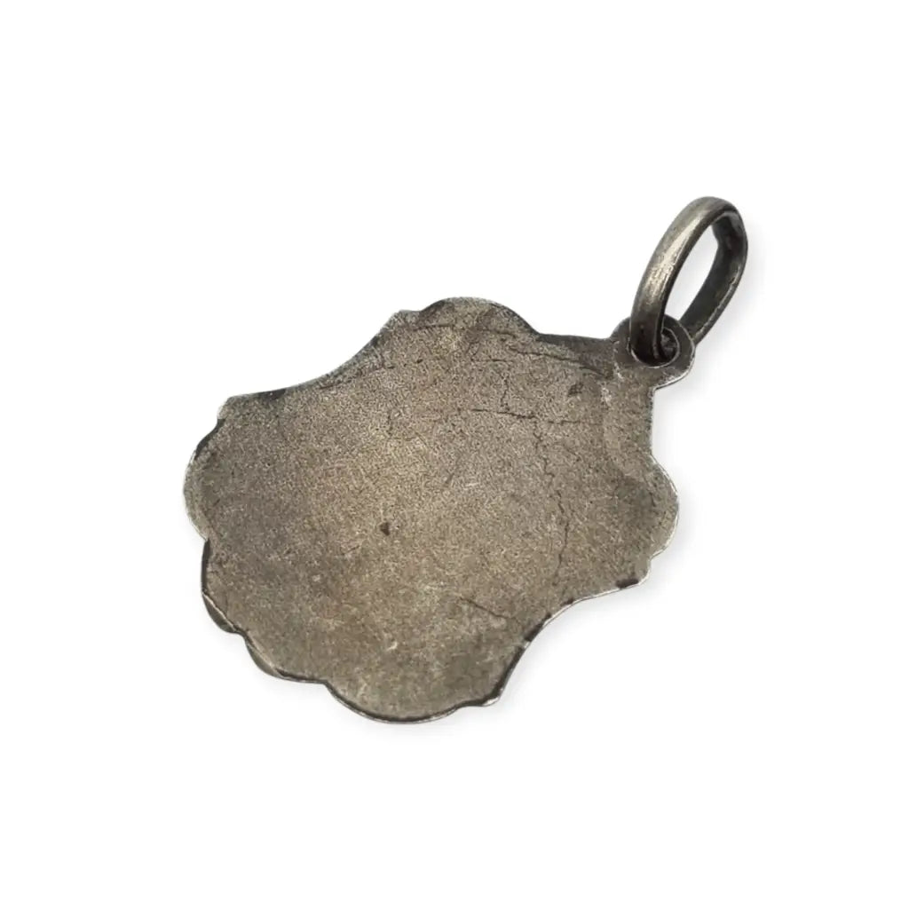 Medalla religiosa antigua en plata con la Moreneta de Montserrat estilo