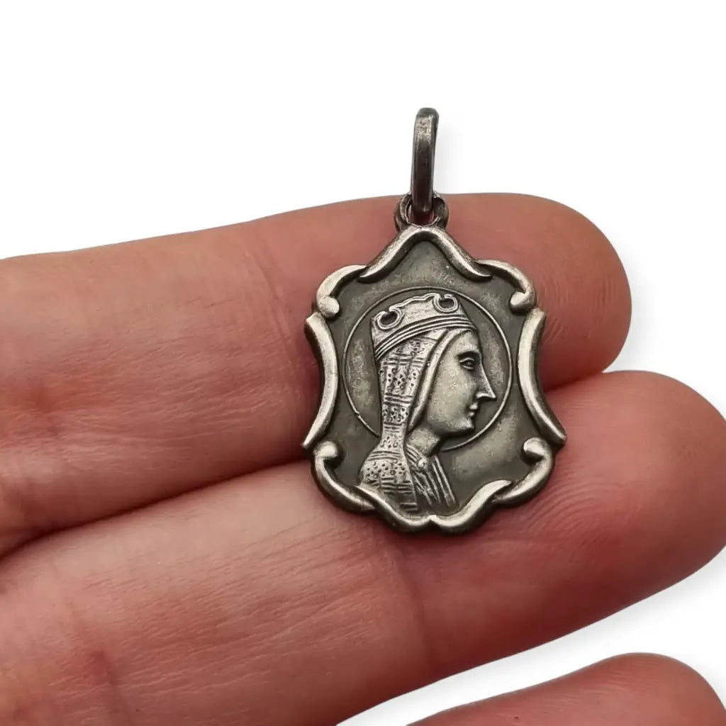 Medalla religiosa antigua en plata con la Moreneta de Montserrat estilo