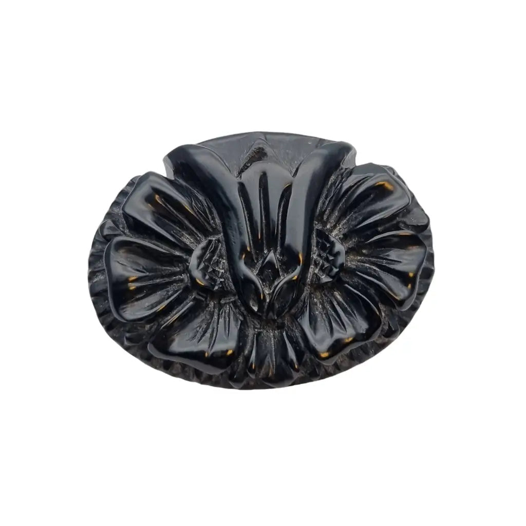 Broche vintage de baquelita negra tallas florales para la solapa o sombrero