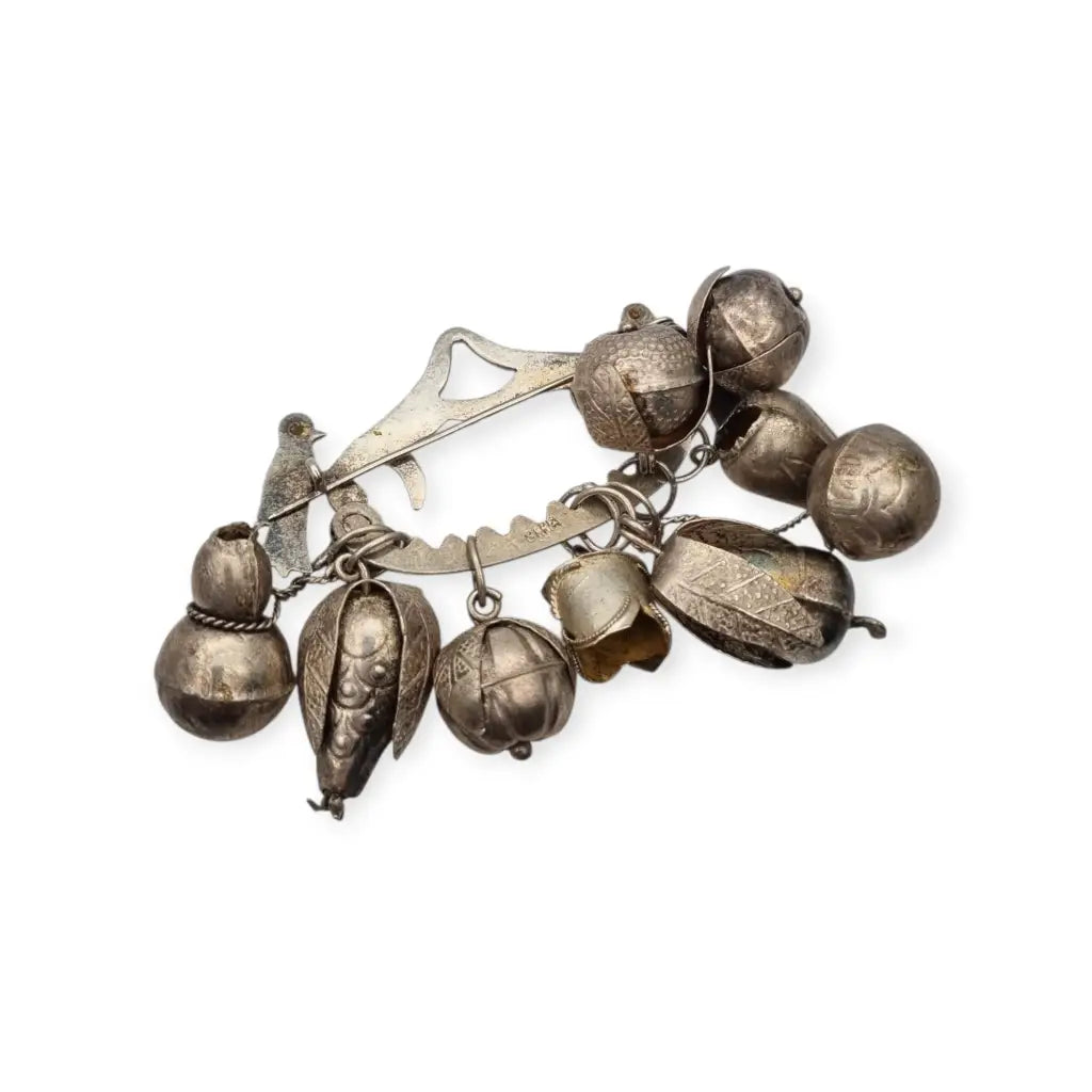 Penca de Balangandã Gerson Bahia firmado broche amuleto brasileño con dijes