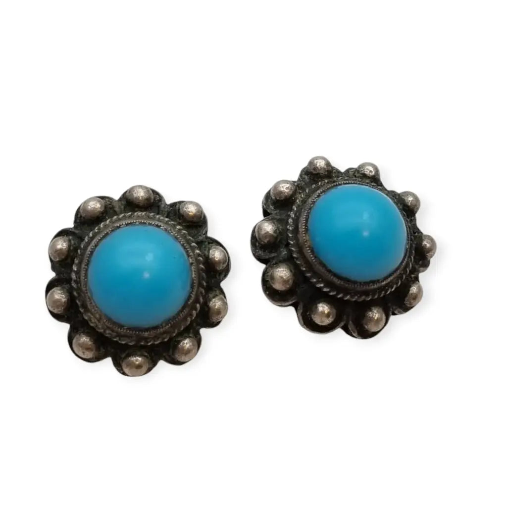 Pendientes vintage boho charro de plata con piedra azul central circa 1970.