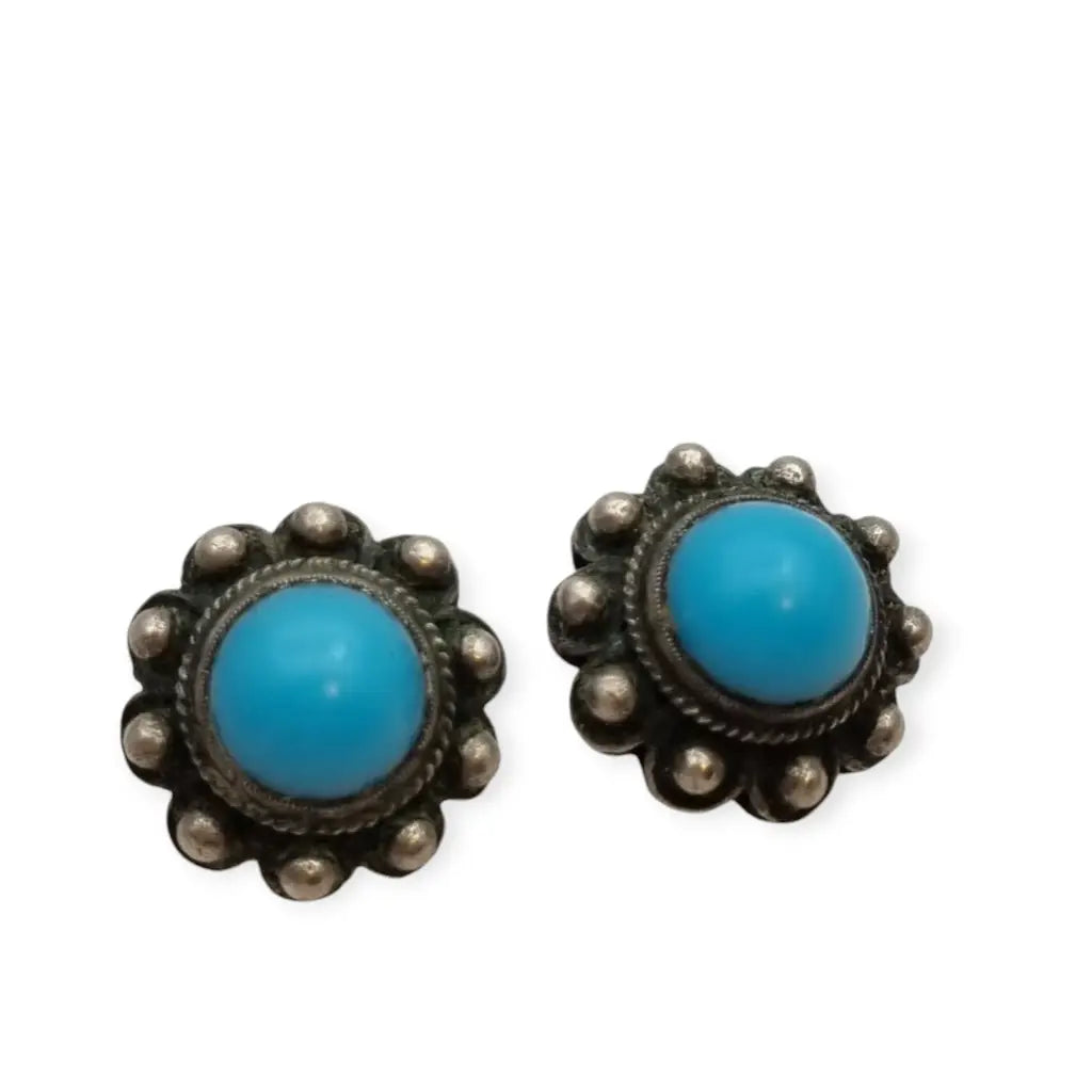 Pendientes vintage boho charro de plata con piedra azul central circa 1970.