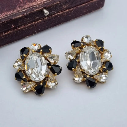 Pendientes vintage joyas doradas pedrería blanca y negra Purificación García PG