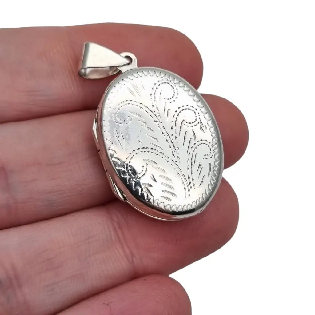 Medallón en forma de óvalo plata ley antigua vintage portafotos colgante