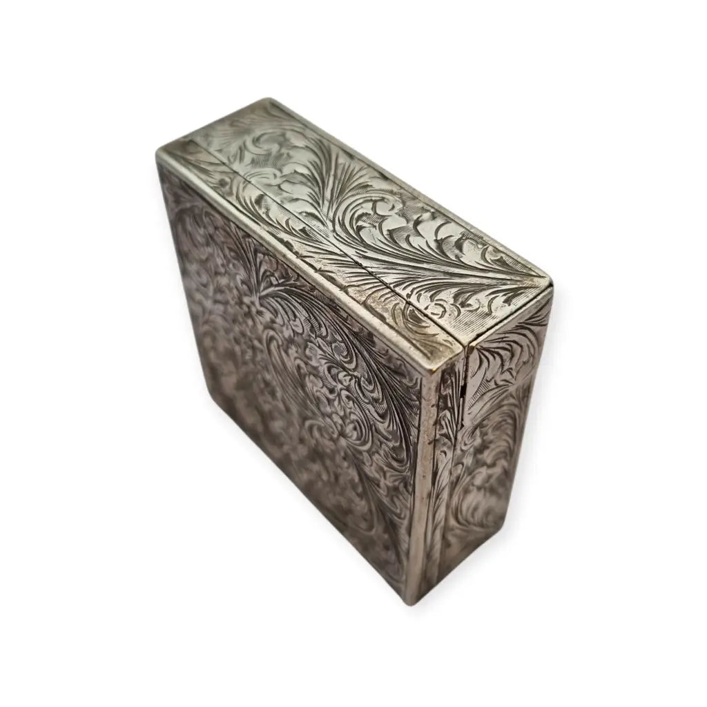 Polvera Art Déco en plata grabada apertura por pulsador lateral compartimento