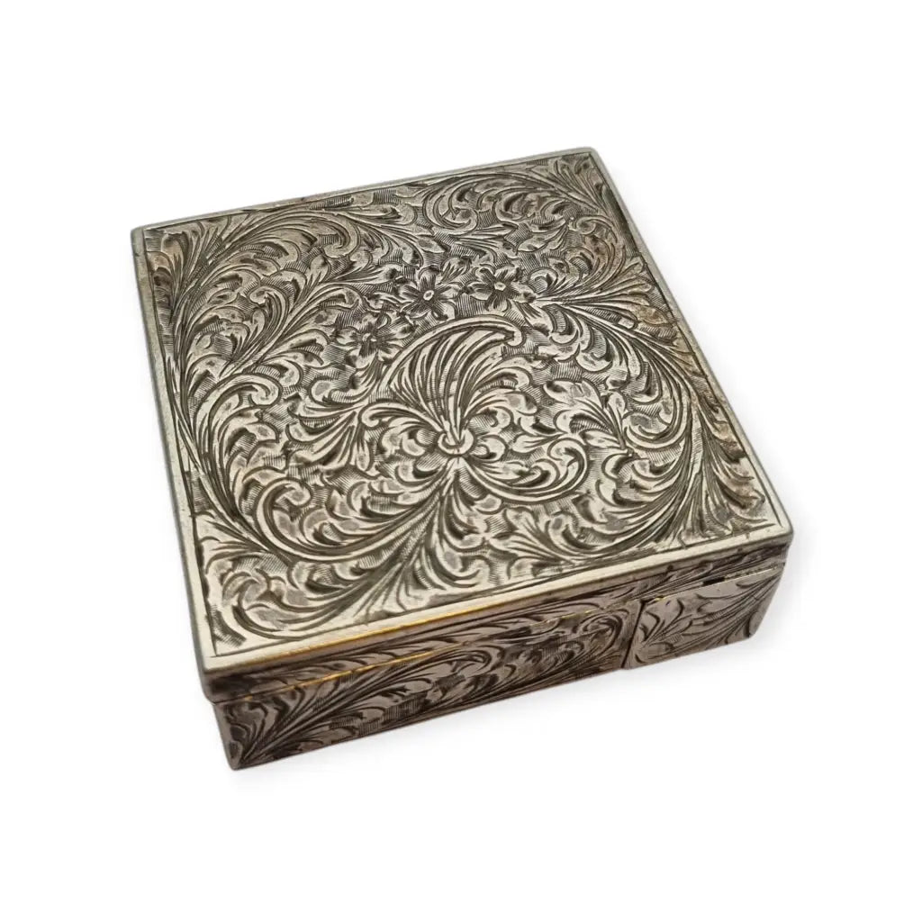 Polvera Art Déco en plata grabada apertura por pulsador lateral compartimento