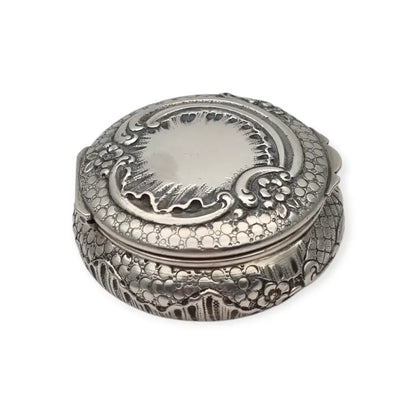 Polvera modernista en plata repujada con espejo interior Art Nouveau ca.