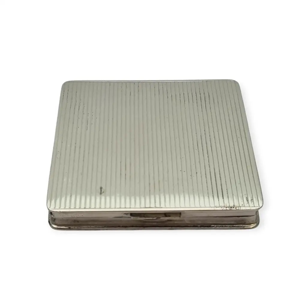 Polvera vintage años 50 en plata 925 con grabado estrellado y espejo interior.