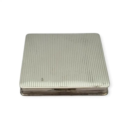 Polvera vintage años 50 en plata 925 con grabado estrellado y espejo interior.