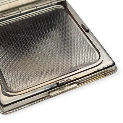 Polvera vintage años 50 en plata 925 con grabado estrellado y espejo interior.