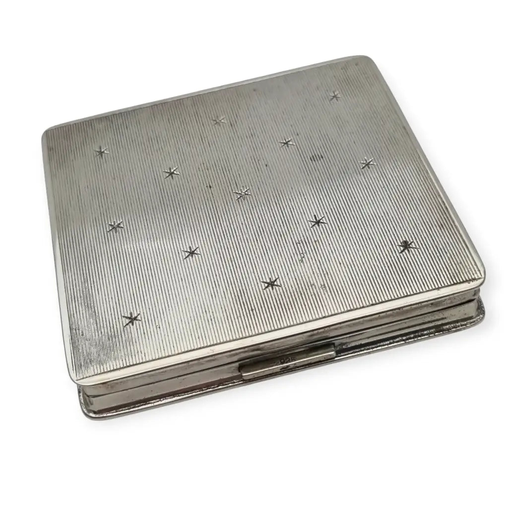 Polvera vintage años 50 en plata 925 con grabado estrellado y espejo interior.