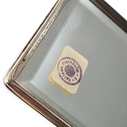 Polvera vintage años 50 en plata 925 con grabado estrellado y espejo interior.