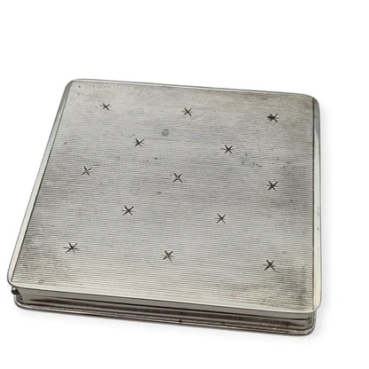 Polvera vintage años 50 en plata 925 con grabado estrellado y espejo interior.