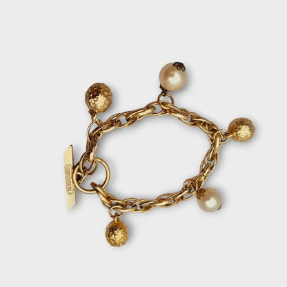 Pulsera vintage Cacharel con perlas años 80 línea de lencería