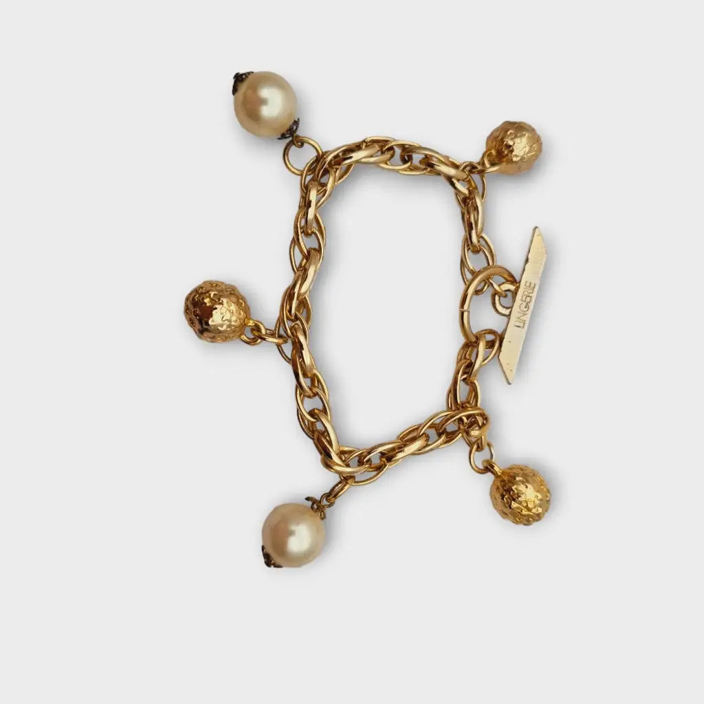 Pulsera vintage Cacharel con perlas años 80 línea de lencería