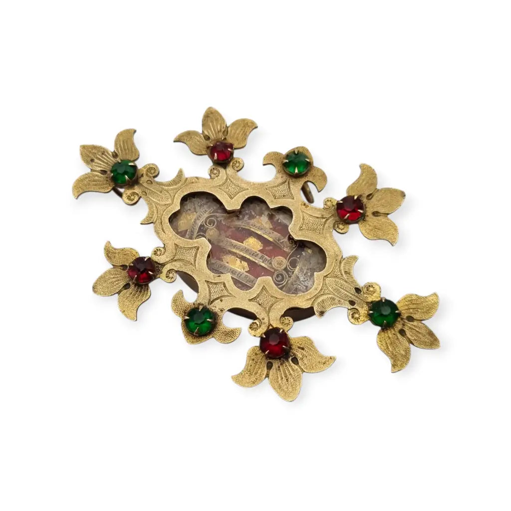 Relicario antiguo colgante con cinco reliquias selladas en metal dorado y gemas