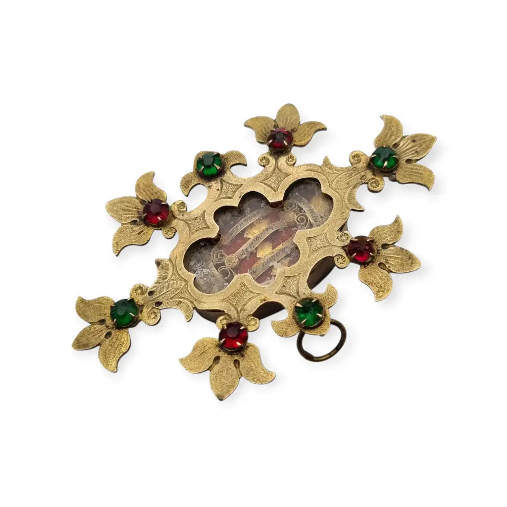 Relicario antiguo colgante con cinco reliquias selladas en metal dorado y gemas