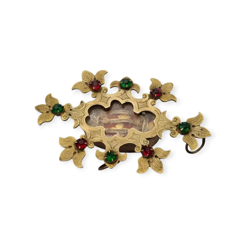 Relicario antiguo colgante con cinco reliquias selladas en metal dorado y gemas